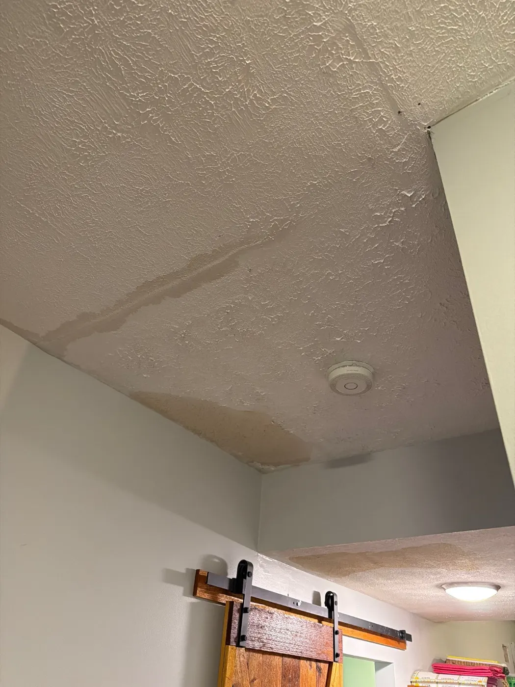 Moisture meter reading on drywall in Spring Mill water loss